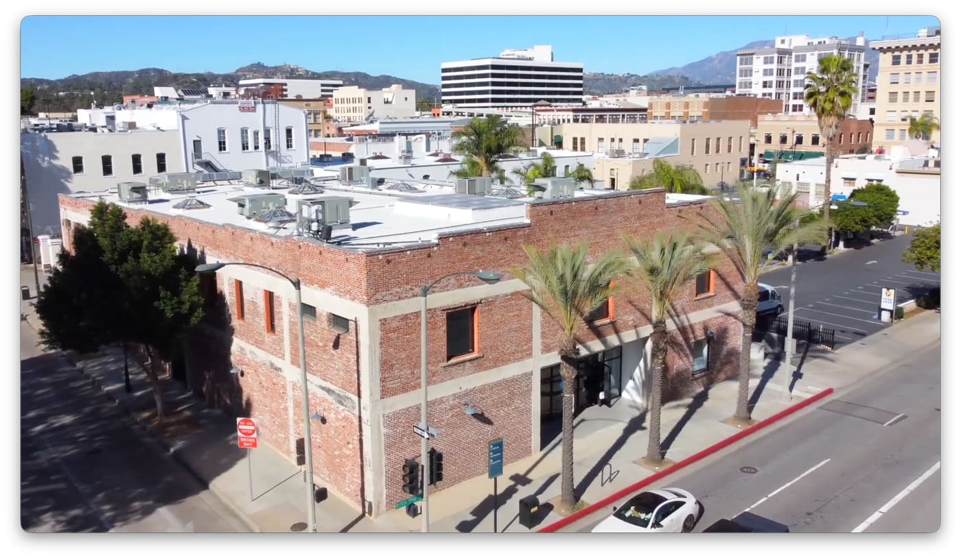 Completed seamless roof coating on the CTRL Collective Pasadena building after HP Roofing Pro restoration