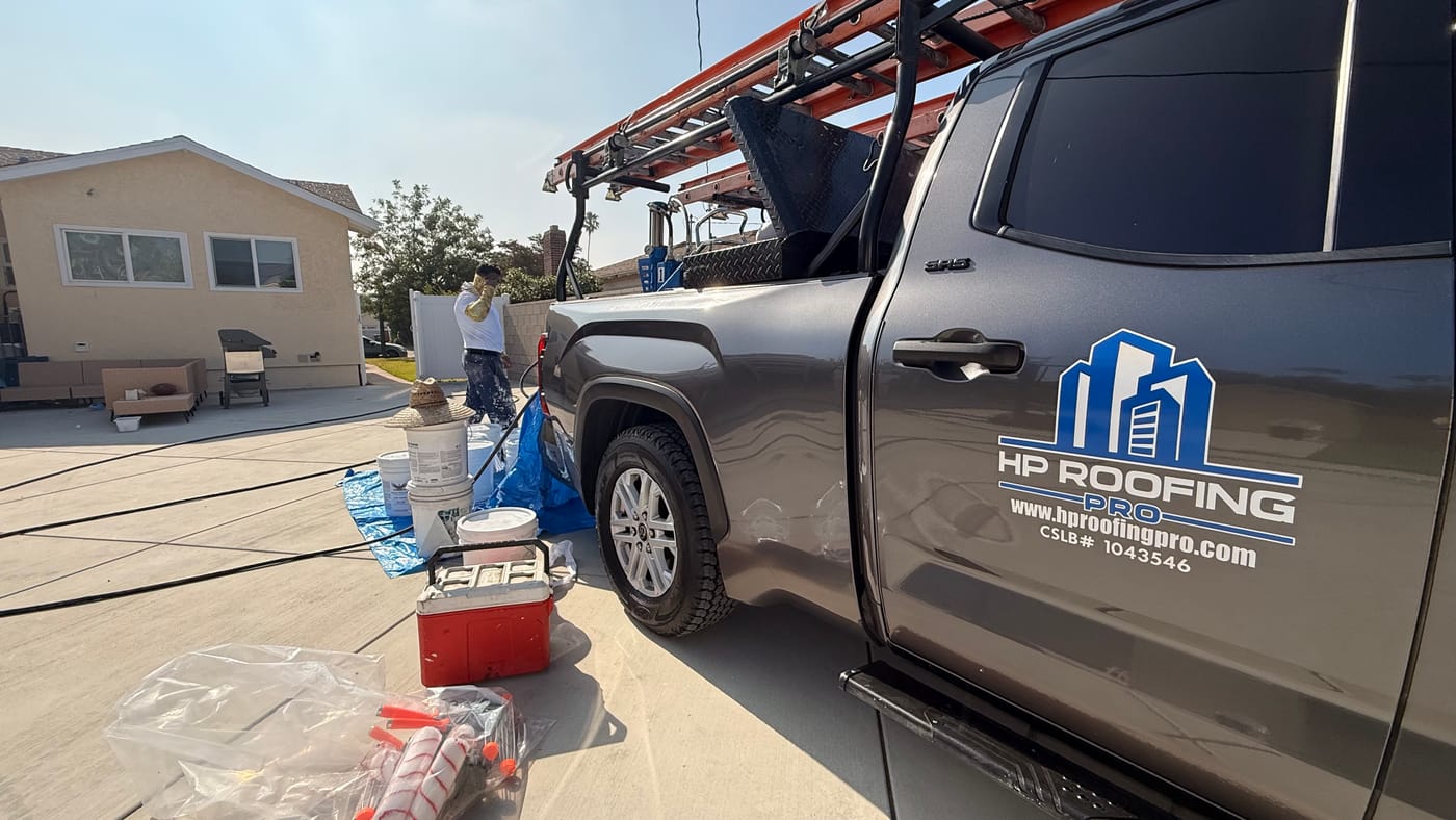 HP Roofing Pro truck on site at a San Gabriel residential RainArmor coating project