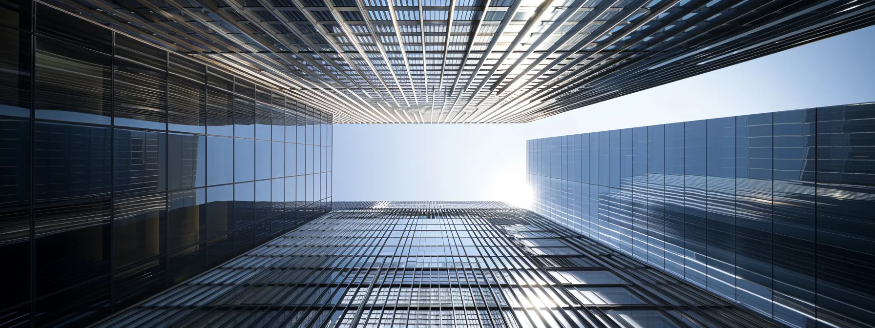 a modern commercial building in los angeles with a sleek, reflective tpo roof shining under the bright california sun.